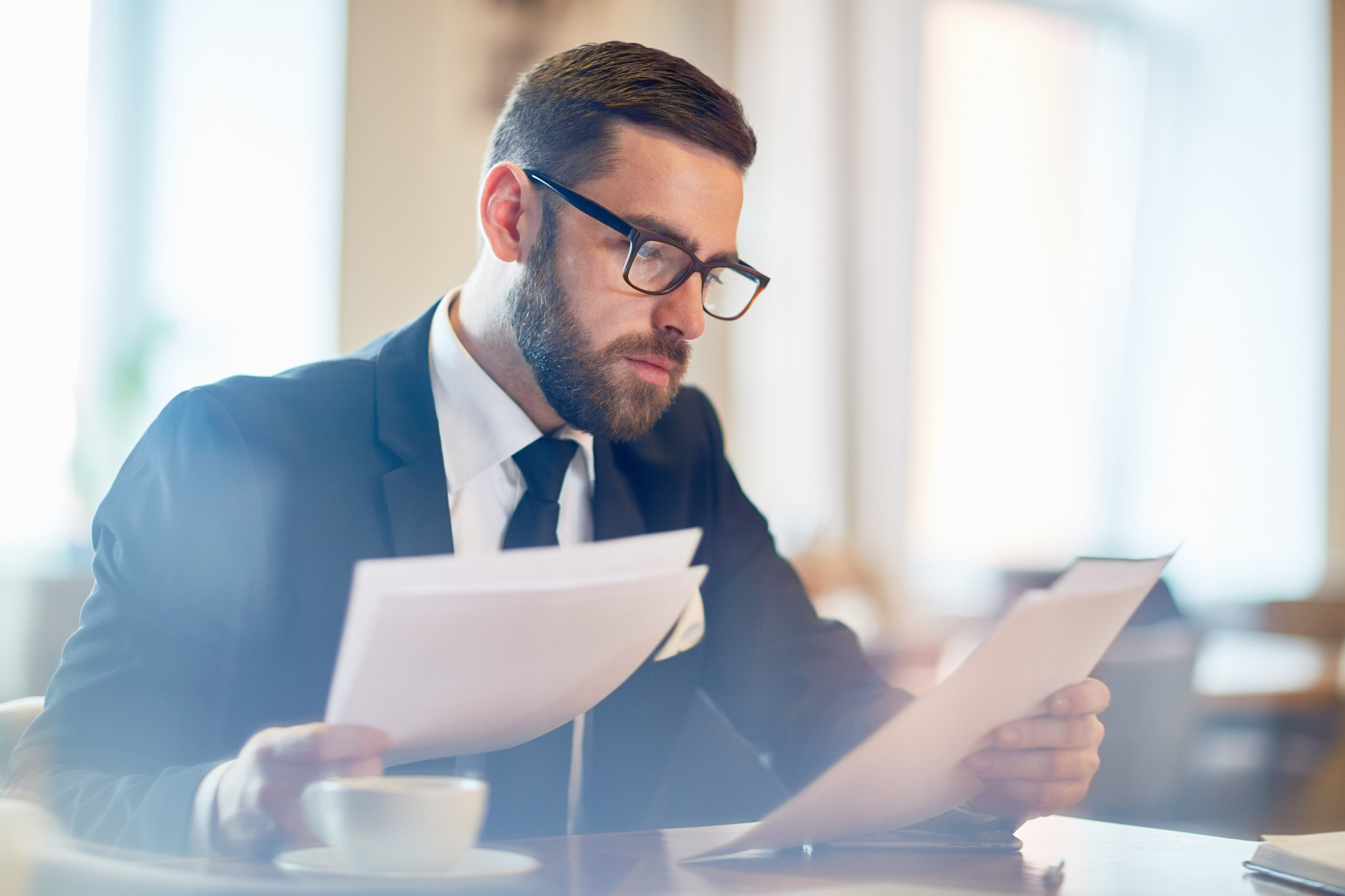 Accountant validating financial statements and reconciliations
